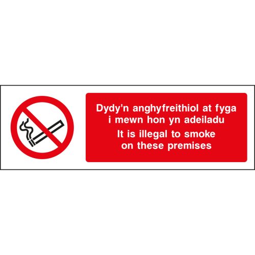 Dydy'n anghyfreithiol at fyga I mewn hom ym adeiladu, It is illegal to smoke on these premises safety sign