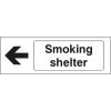 Smoke shelter sign with left arrow