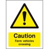 Caution farm vehicles crossing sign