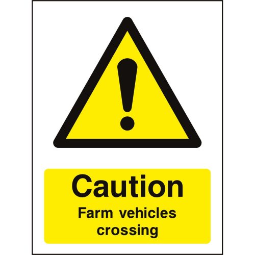Caution farm vehicles crossing sign