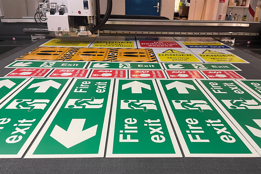 Kongsberg X Edge cutter, cutting safety signs.