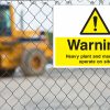 Heavy plant warning sign: Warning heavy plant and machinery operate on site.