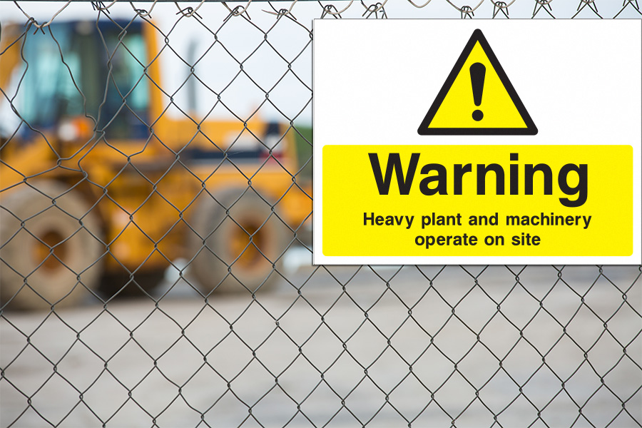 Heavy plant warning sign: Warning heavy plant and machinery operate on site.